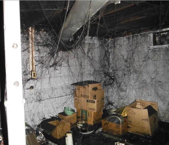 Basement with signs of soot webs